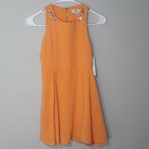 GB girls orange dresses .